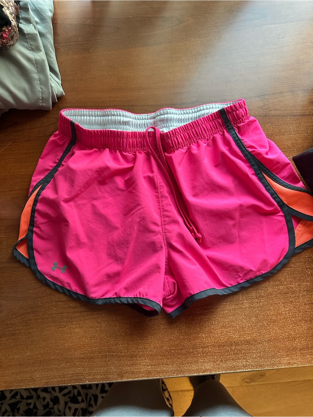 Under Armour Women's Hot Pink Athletic Shorts with Orange Accent